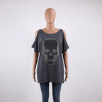 Gray oversized shirt with a skull design on a mannequin against a white background