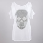 White off-shoulder top with a skull design on a white background