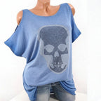 Blue top with a skull design on a mannequin against a white background