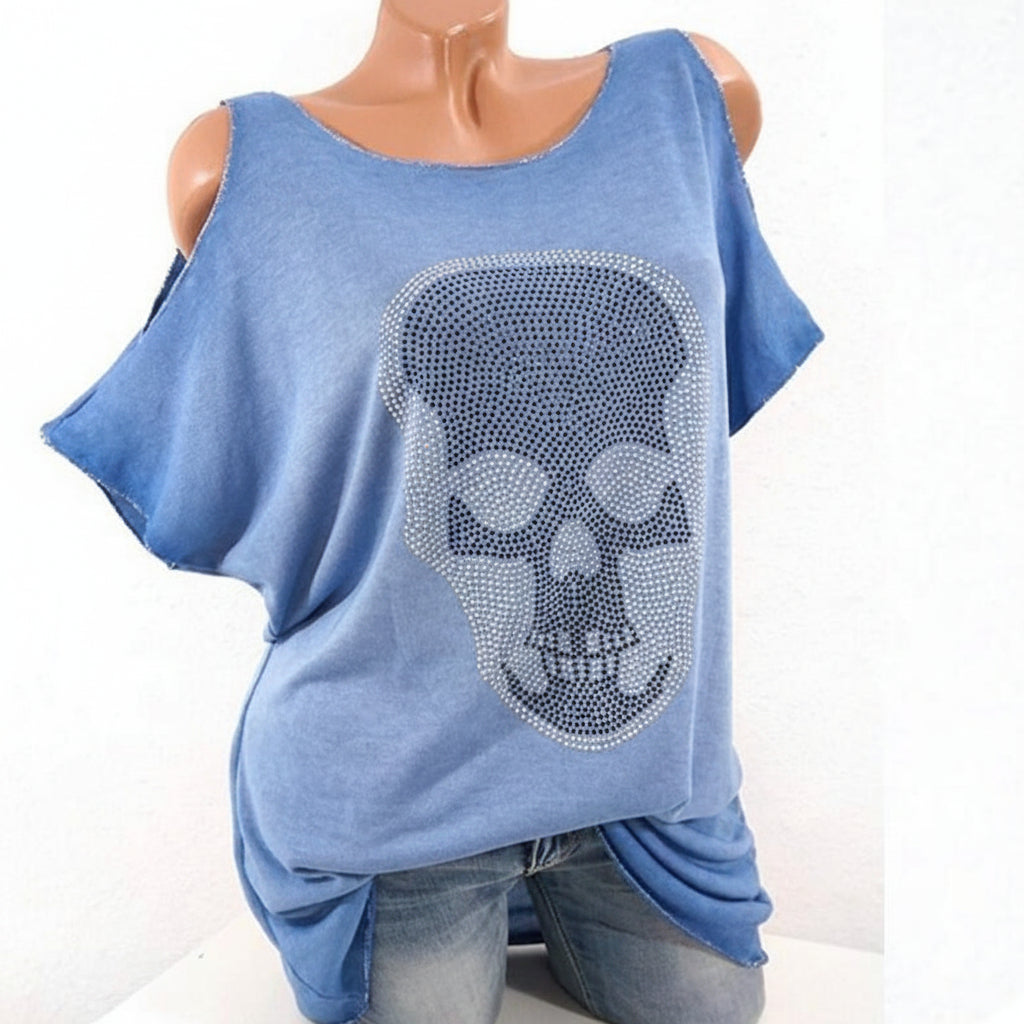 Blue top with a skull design on a mannequin against a white background