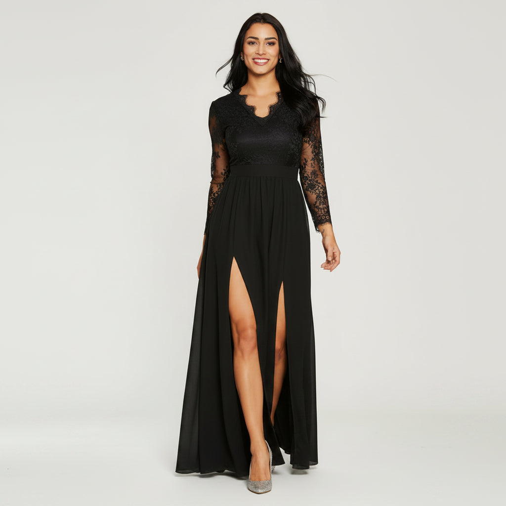 Woman wearing a black lace dress with a slit on a white background