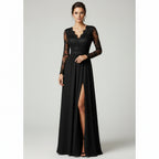 Woman wearing a black lace evening gown in an indoor setting.