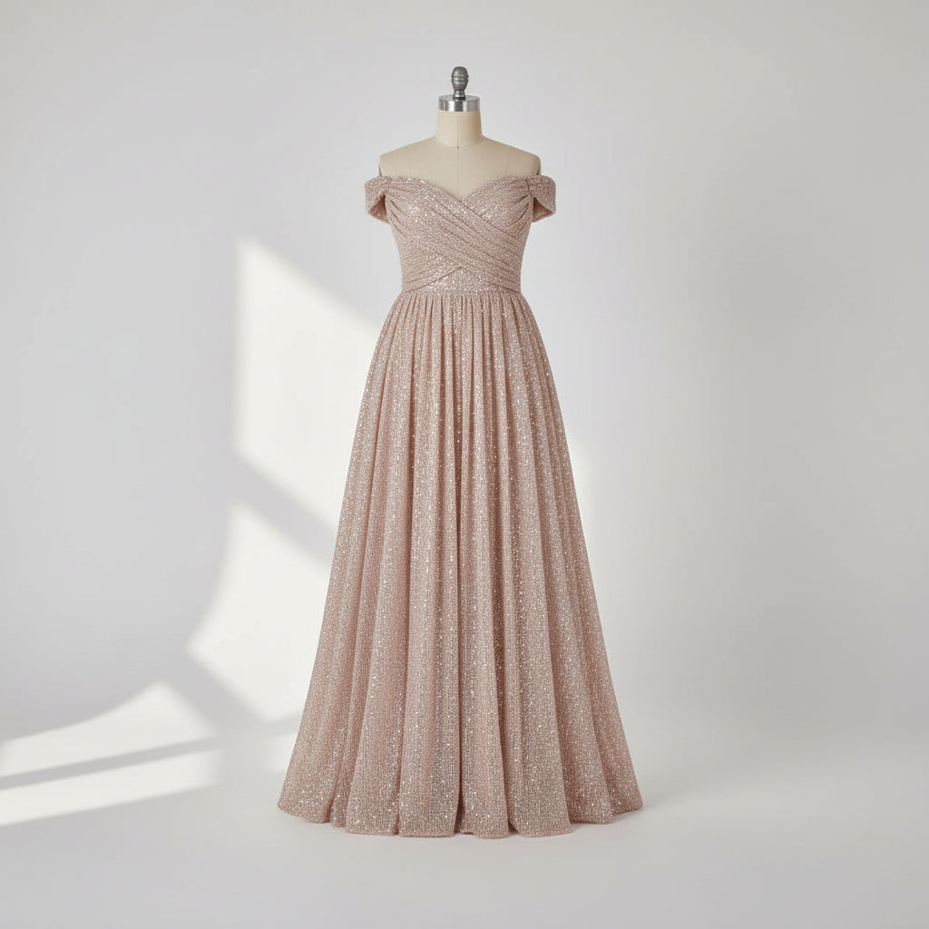 Elegant off-shoulder gown with a high slit on a gray background