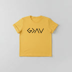 Yellow t-shirt with 'G>AV' design, paired with yellow sneakers and jeans on a wooden surface.