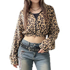 Person wearing a leopard print hoodie and jeans with a white background
