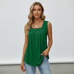 Green sleeveless top worn by a model on a white background